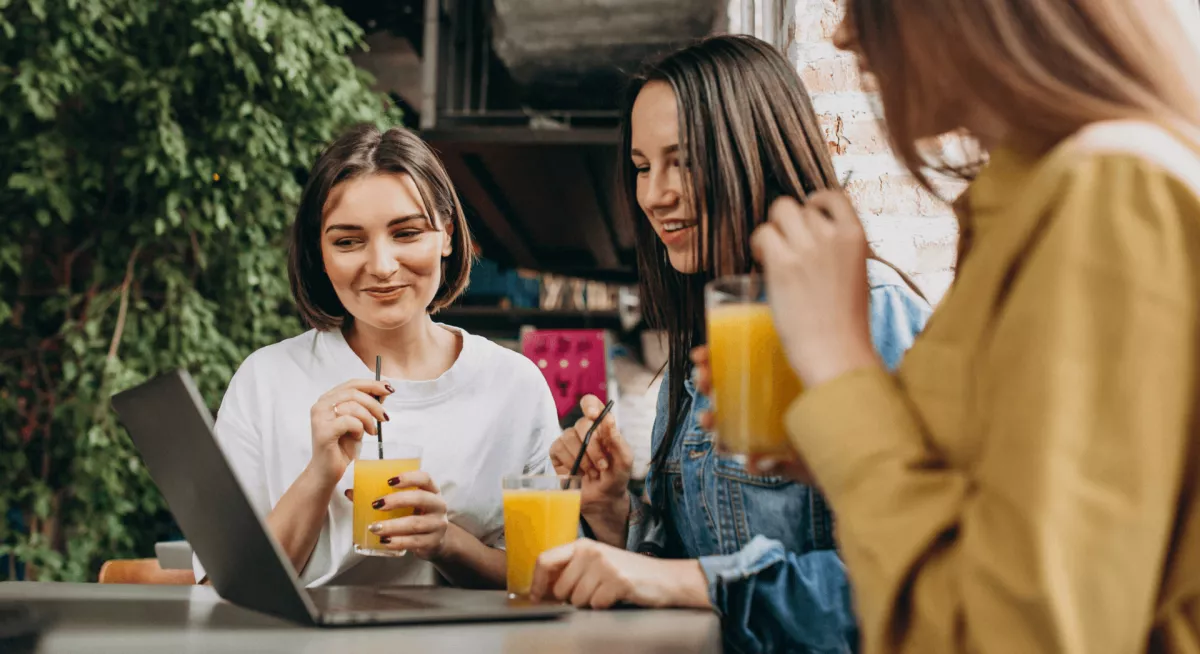 Customers of a bar drinking a juice